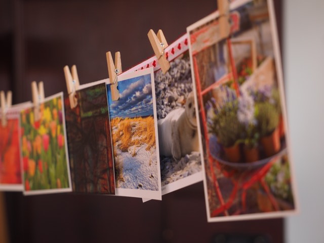 photographs drying on a wire