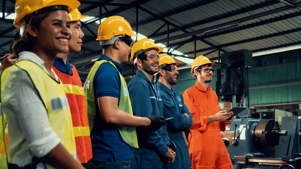 Happy engineers in a warehouse