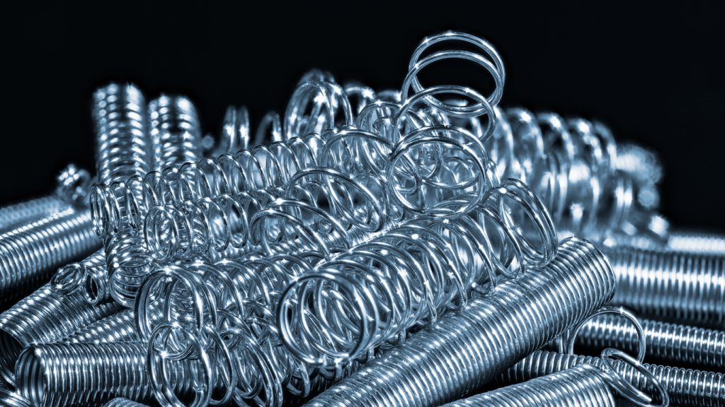 pile of springs with black background