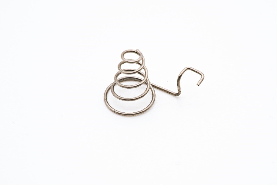 Single metal spring with white background