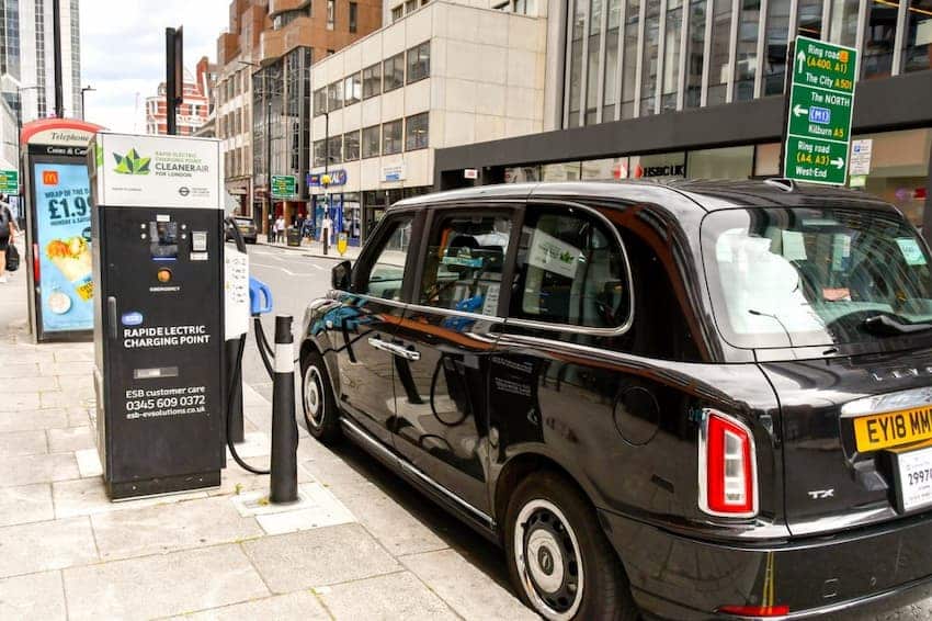 A black taxi on the street